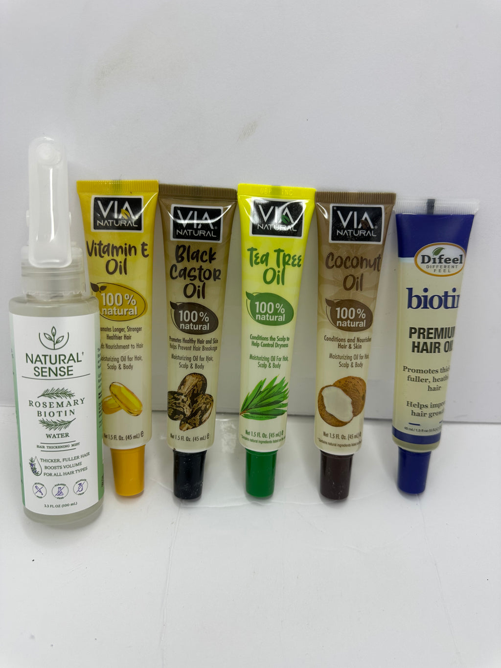 SET DE ACEITES Y TÓNICO A BASE DE ROMERO , BIOTINA, TE DE ÁRBOL,
